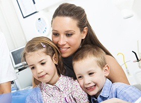 Mother and children at dental office