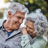 a couple enjoying the benefits of dental implants in Covina
