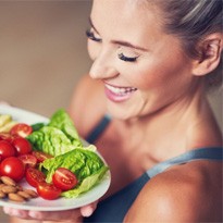 woman eating healthy for dental implant care in Covina 