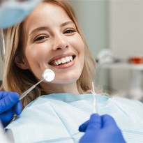 patient receiving dental implant care in Covina 